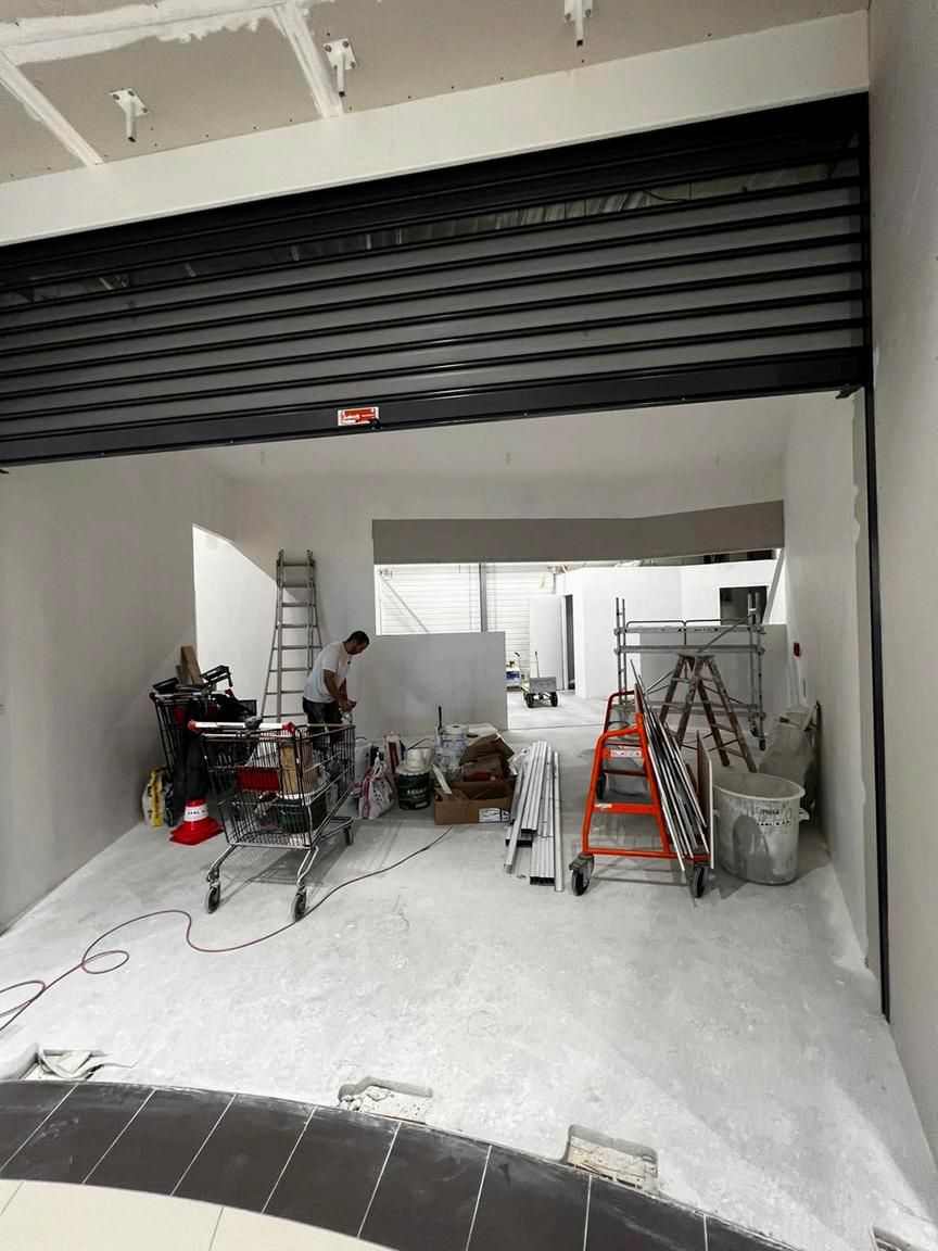 Agencement pressing Castelnaudary — rénovation commerce de proximité