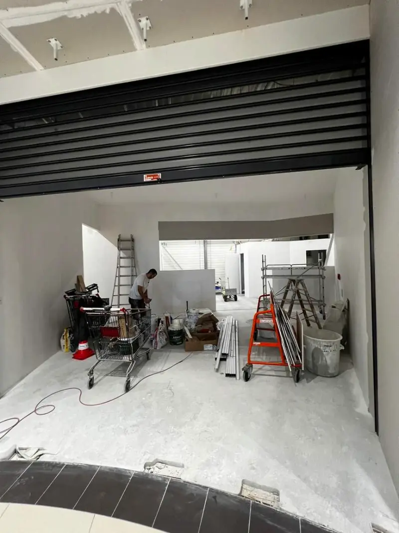 Agencement pressing Castelnaudary — rénovation commerce de proximité